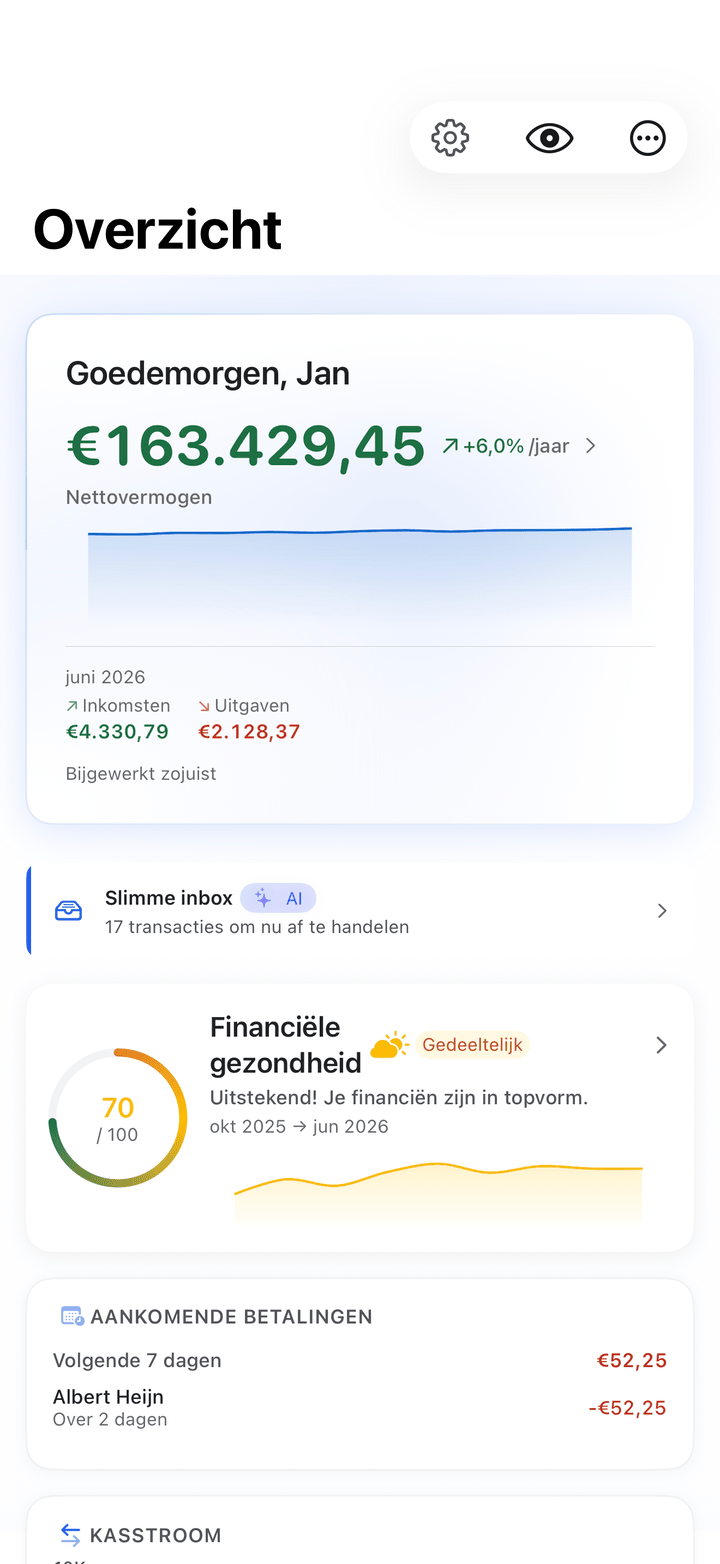 Net worth and monthly cash flow dashboard on iPhone